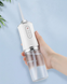Ірригатор для порожнини рота ORAL IRRIGATOR 3 режими з насадками білий eve1282 фото 5