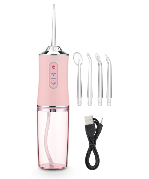 Ірригатор для порожнини рота ORAL IRRIGATOR 3 режими з насадками рожевий eve1283 фото