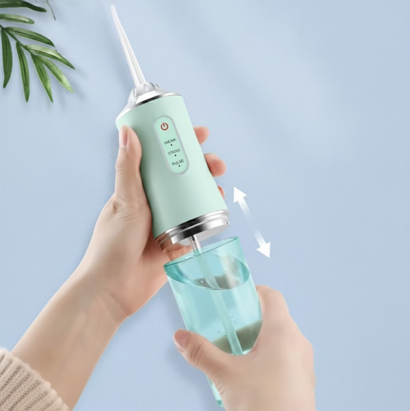 Ирригатор для полости рта ORAL IRRIGATOR 3 режима с насадками зеленый eve1284 фото